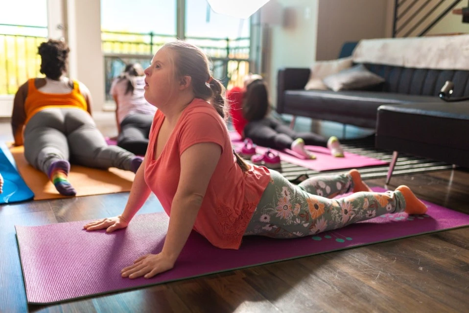 Disabled friends in yoga class